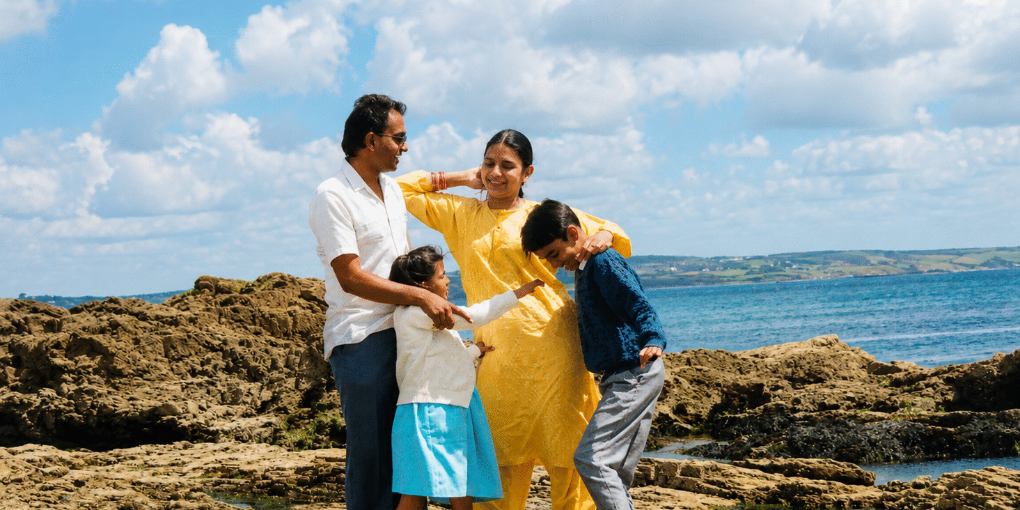 family on rocks