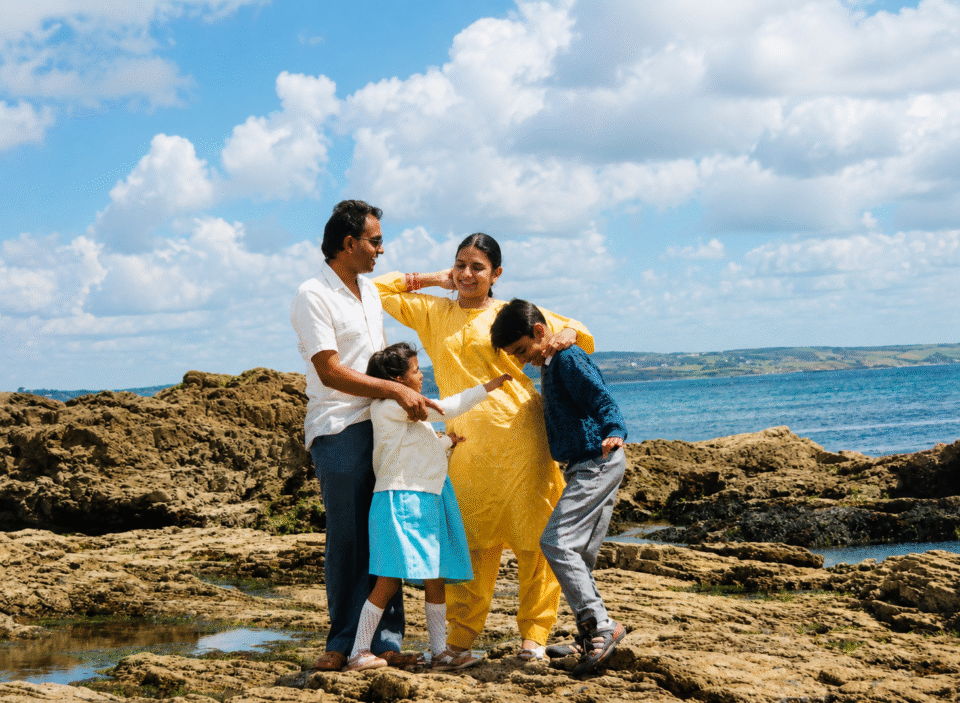 family on rocks